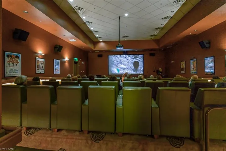 Home theater with carpet flooring and recessed lighting