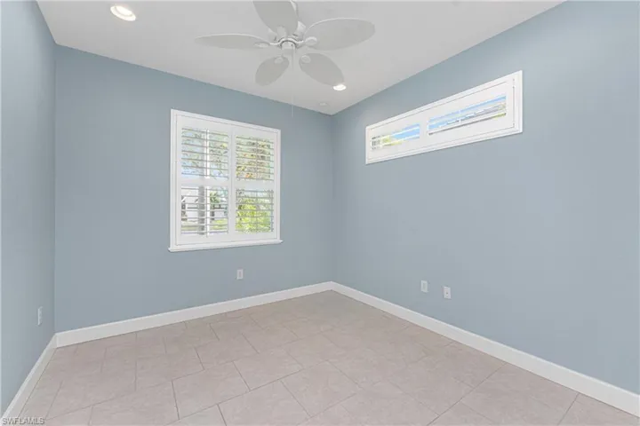 Unfurnished room with ceiling fan
