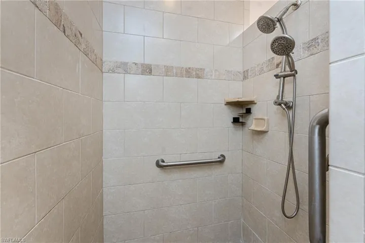 Bathroom featuring a tile shower