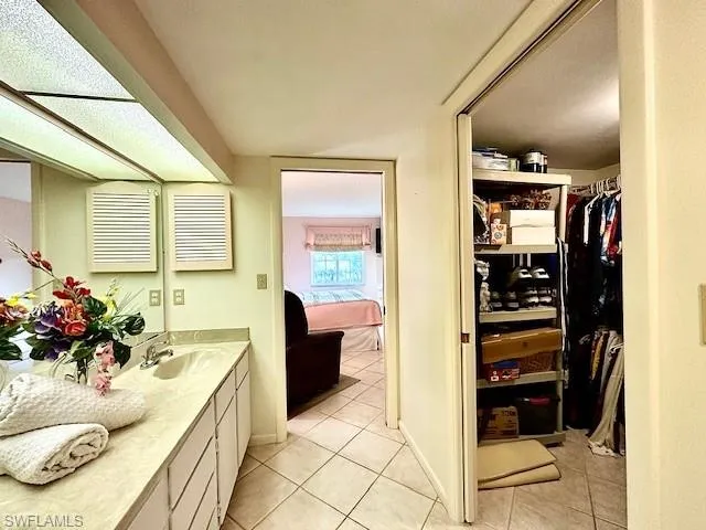 Bathroom featuring vanity and tile patterned floors