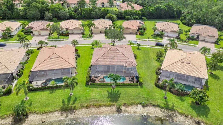 Aerial view of residential area with a nearby body of water