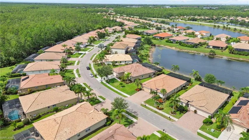 View of property location with nearby suburban area and a large body of water