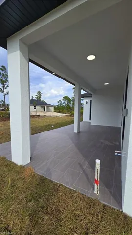 Laundry room featuring a sink and separate washer and dryer