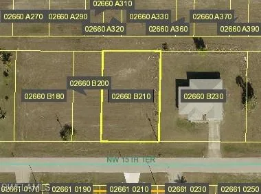 Aerial map of property and surrounding area with property parcel outlined