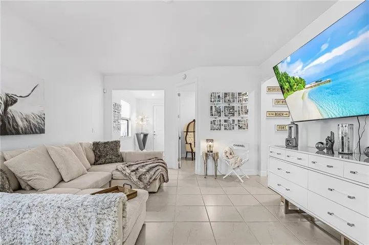 As you enter through the entryway, you’re welcomed into a cozy and comfortable living space filled with natural light