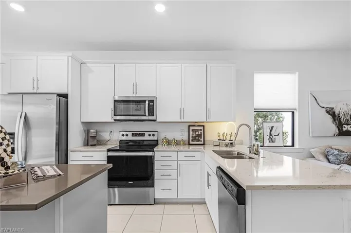 Beautiful kitchen with plenty of cabinet space and a pantry