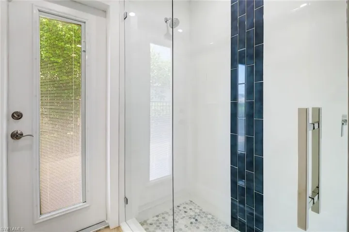 Bathroom featuring an enclosed shower
