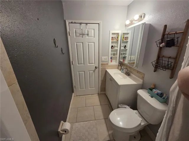 Guest Bathroom with tub.