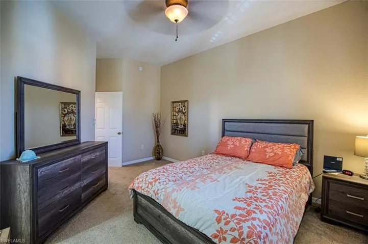 Guest bedroom with attached bath and walk in closet