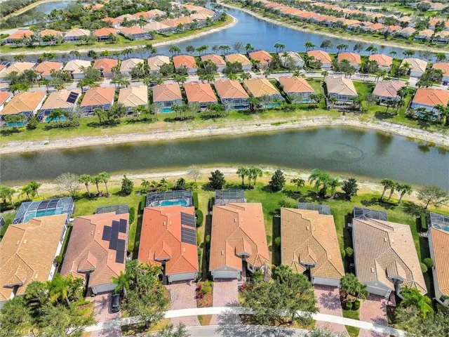 Aerial view of residential area with a large body of water