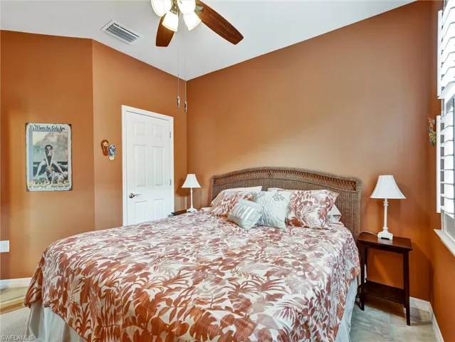 Bedroom with baseboards and ceiling fan