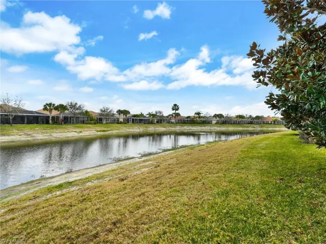 Water view with nearby suburban area