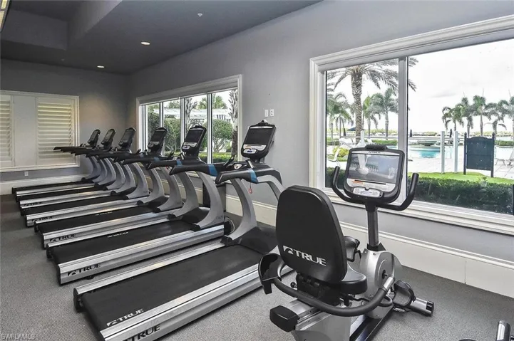 Exercise room featuring recessed lighting