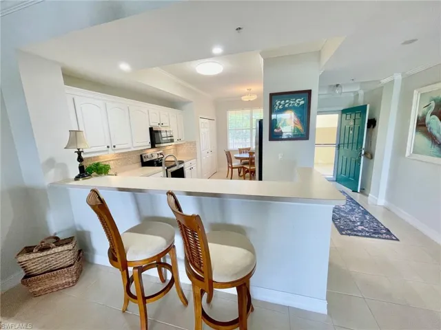 Kitchen featuring Breakfast Bar