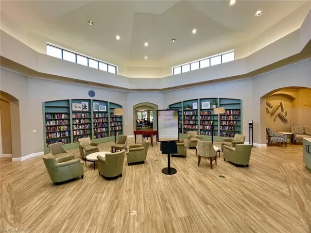 Spacious library, gaming, and social building with business center