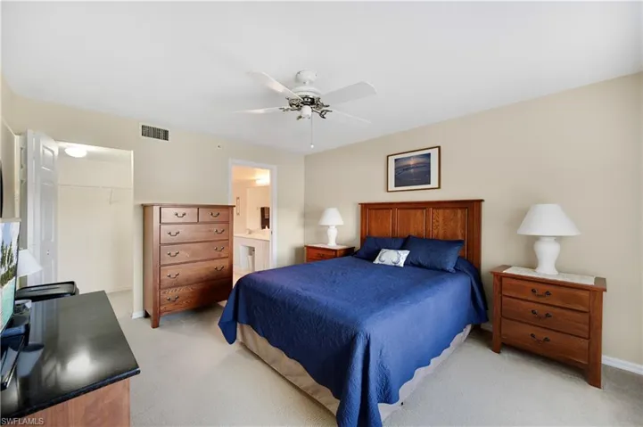 Bedroom with carpet and ceiling fan