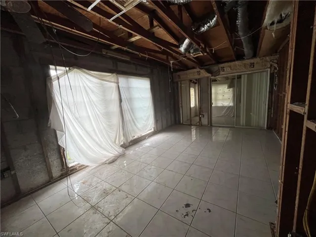 Misc room with tile floors