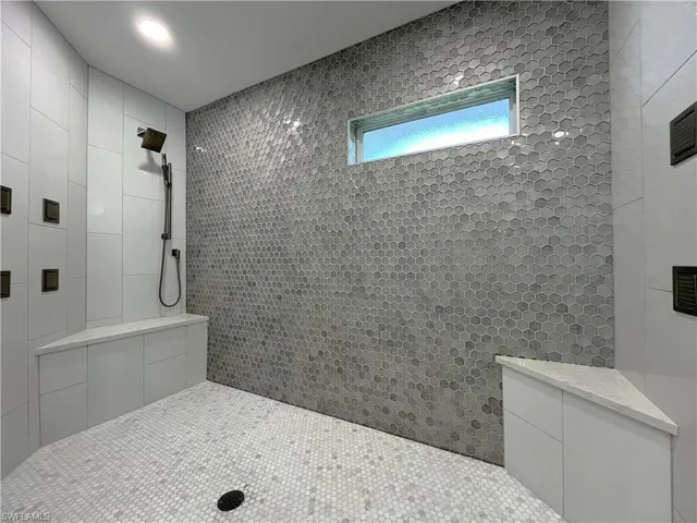 Primary bathroom's HUGE shower with numerous jets.