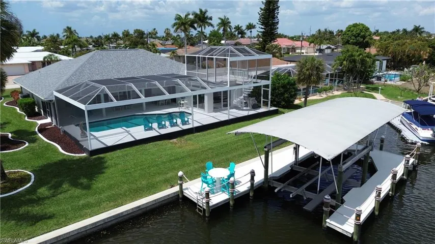 Extended pool deck spans the full width of the home.