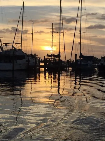 Water view featuring a dock