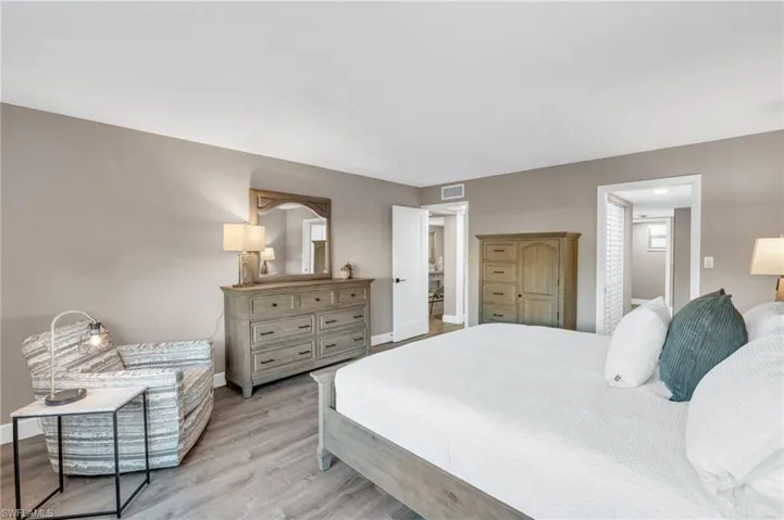 Bedroom with light hardwood / wood-style flooring