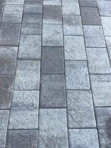 Pavers in driveway, lanai and sidewalk from house to boat dock