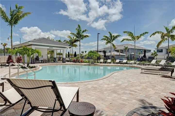 Community pool featuring a patio area