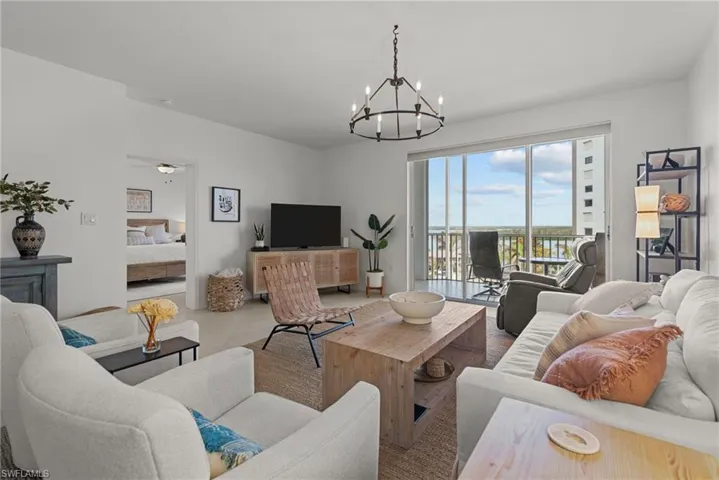 Living room with a notable chandelier