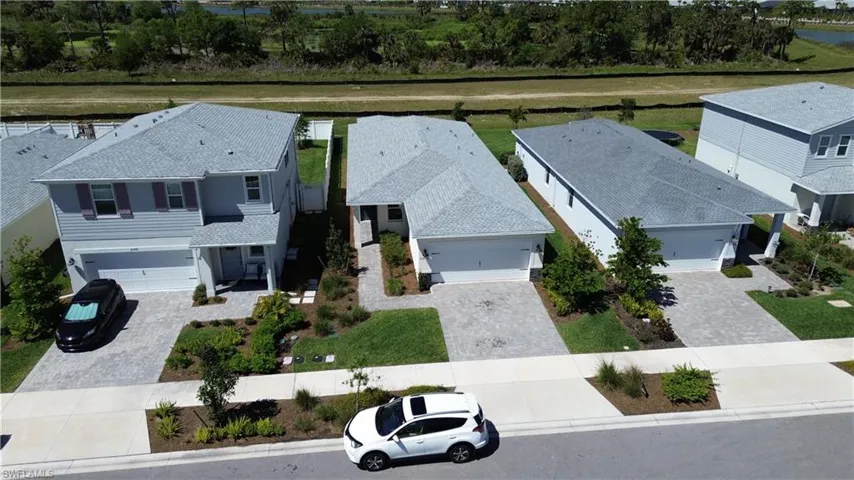 Birds eye view of property with a residential view