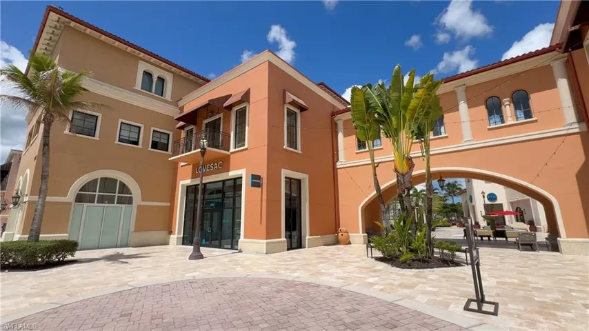 Mediterranean-inspired architecture with stucco exteriors and arched windows