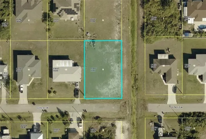Aerial map of property and surrounding area featuring property boundaries highlighted
