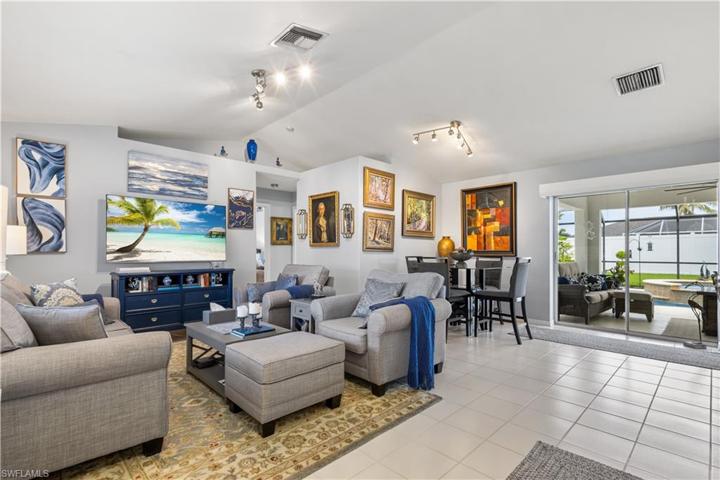 enter the open living area with sliders that fully open to lanai