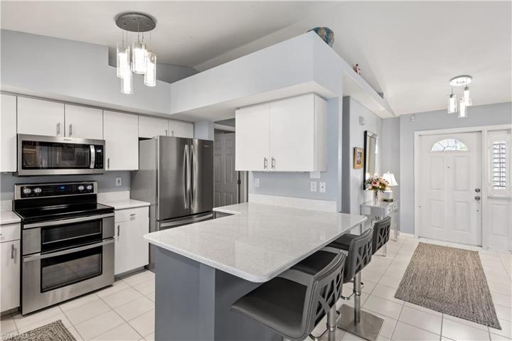 Plenty of storage and counter space...pantry just beyond the fridge