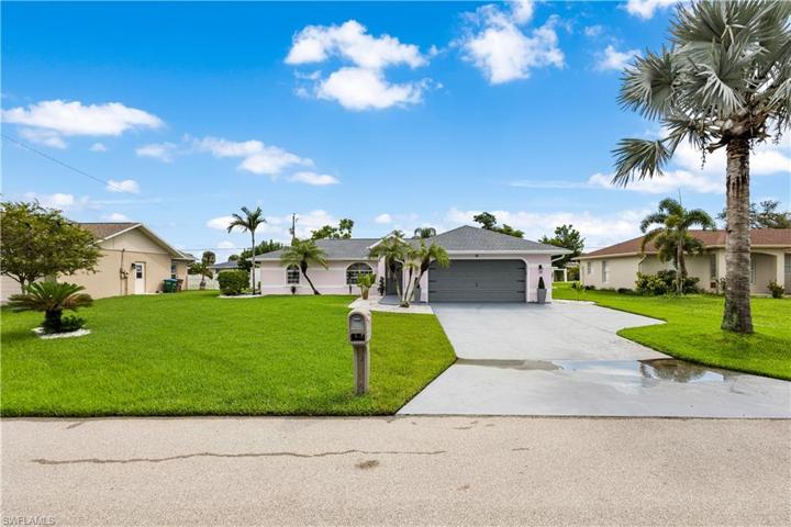 Impeccable landscaping and such character!