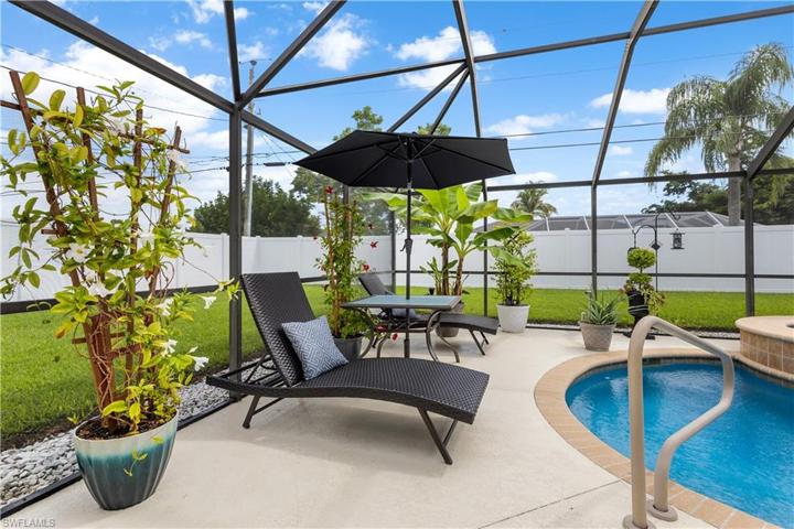 lounge area by pool and spa
