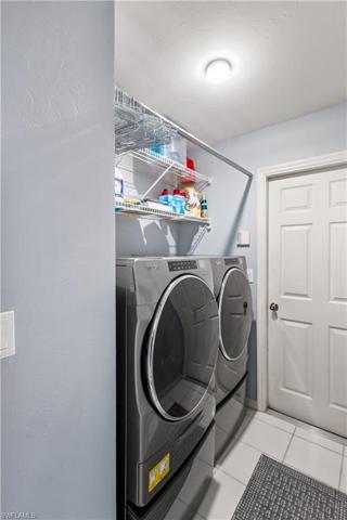 Laundry in residence, door to 2-car garage