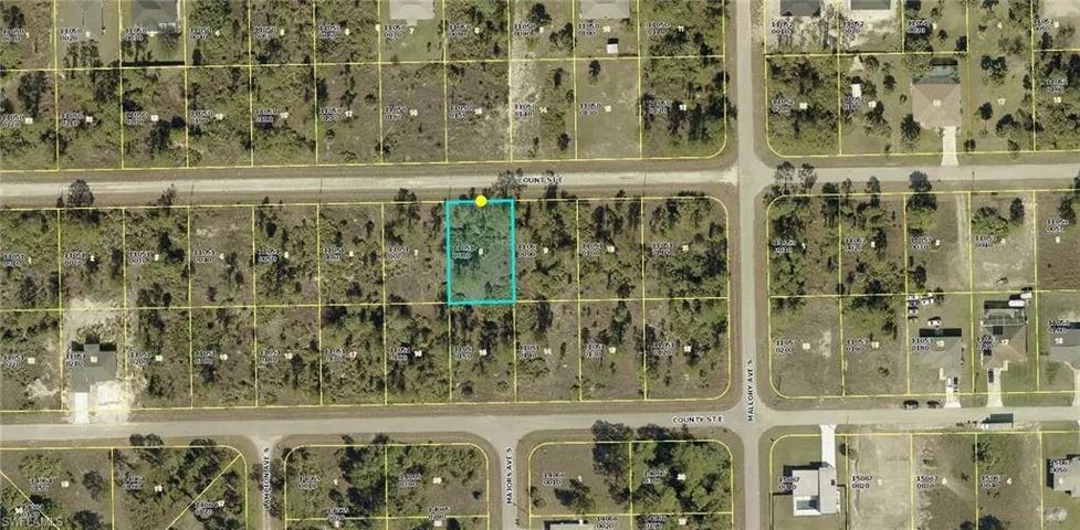 Aerial map of property and surrounding area featuring property boundaries highlighted