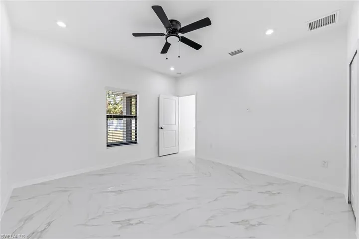 Unfurnished room with ceiling fan