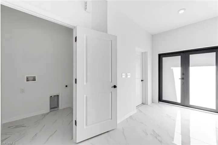 Hall featuring french doors