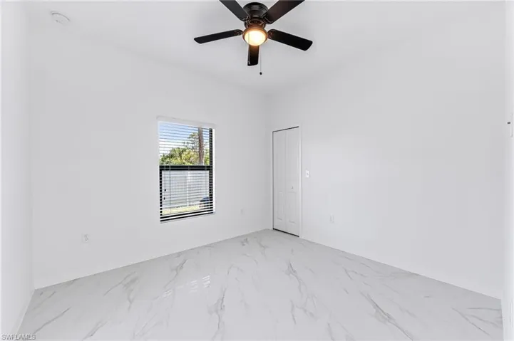 Unfurnished room with ceiling fan