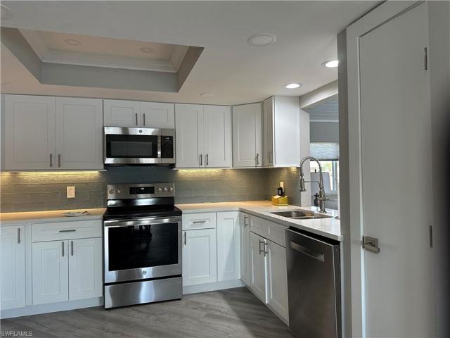 Remodeled Kitchen with Granite countertops