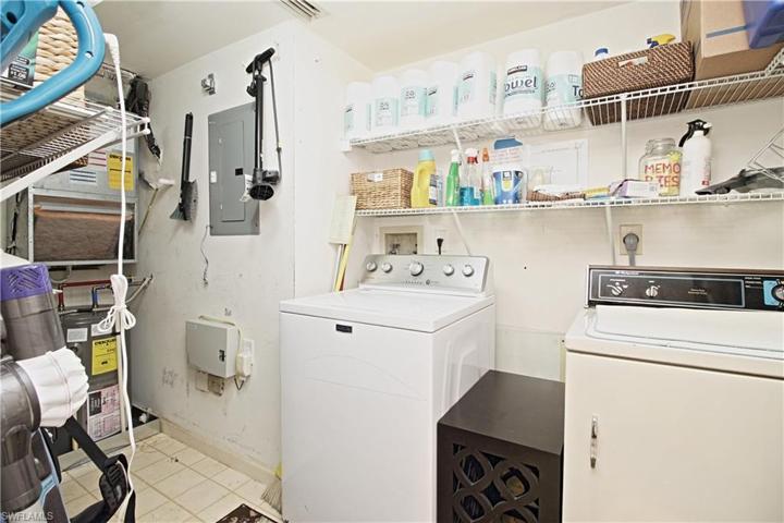 Large laundry room with extra storage