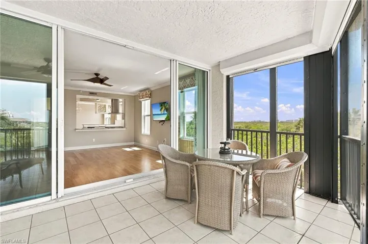 Great room opens to lanai with roll down shutters