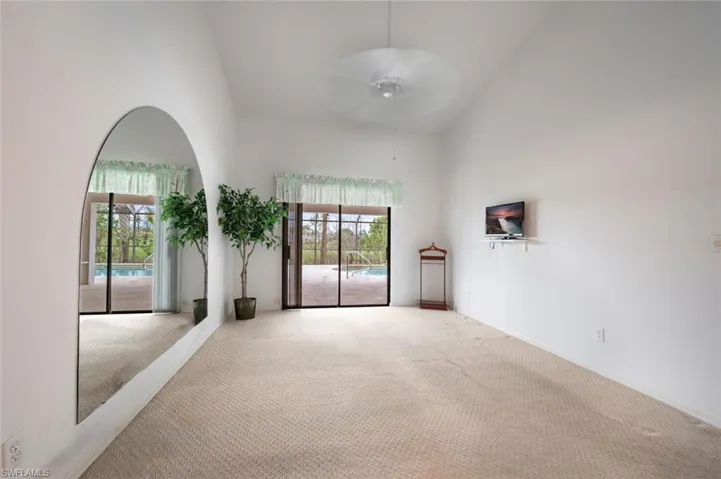 Primary Bedroom with Slider to Pool