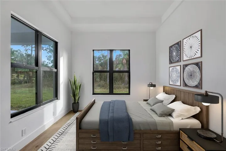 Virtually Staged-Bedroom featuring light wood-type flooring