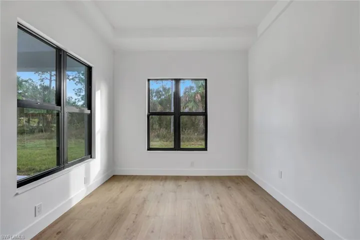 Empty room featuring light wood-type flooring