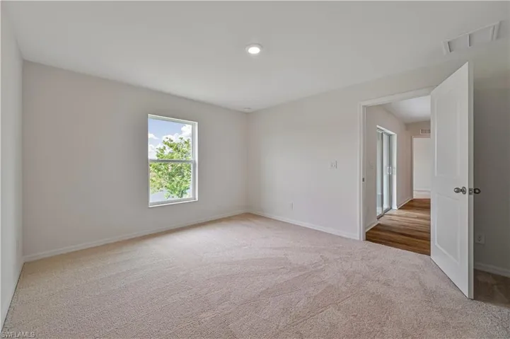 Empty room featuring carpet
