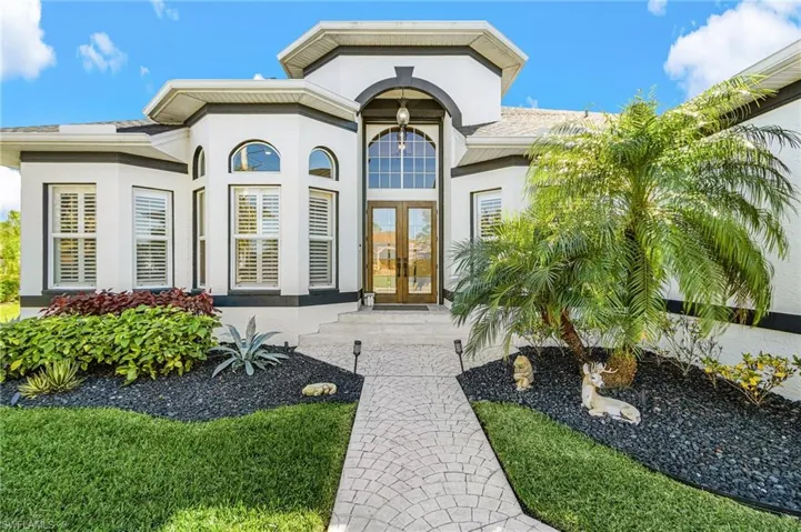 stylish, double entry door providing a dramatic entry to elegance.