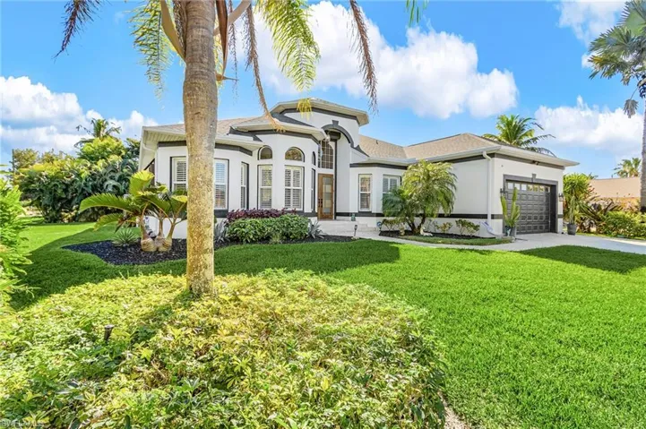 Over sized corner lot with scenic drive up view.