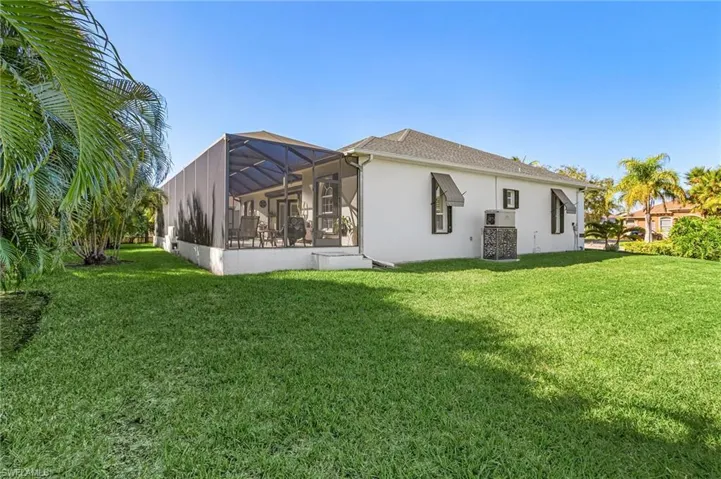Well manicured lawn is a standout with all of the extra space next to the home.  Great area for a game of soccer.